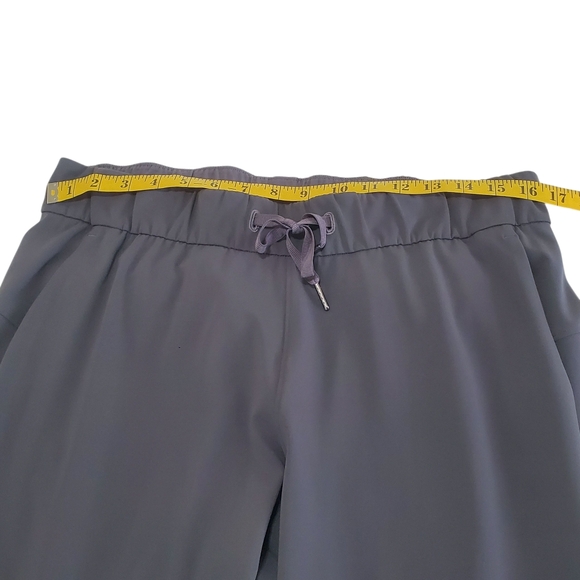 Lululemon On The Fly Pant 28” Melanite Athleisure Athletic - Picture 12 of 15